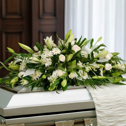 Funeral Arrangement Covers Box With White Roses and Lilies