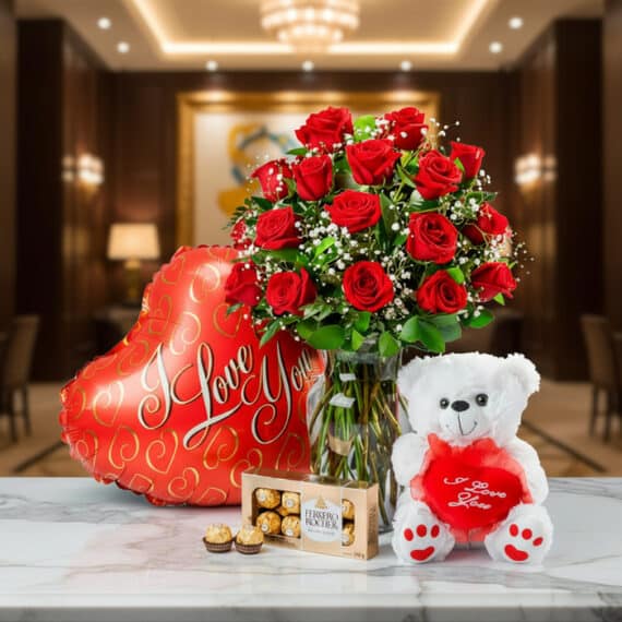 Jarrón Dulce Amor: Rosas Rojas, Osito y Chocolates para Regalar Jarrón Dulce Amor con rosas rojas frescas, un osito de peluche blanco con corazón rojo, chocolates Ferrero Rocher y un globo